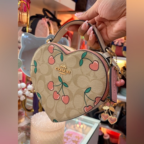 Coach Handbags - Coach Heart Cherry Light Khaki Signature Print - Like New